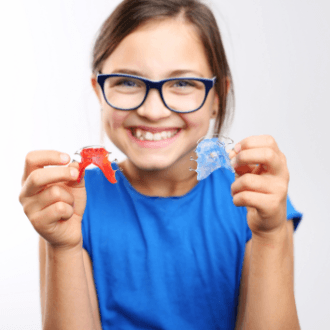 Teen girl with orthodontic appliances